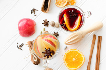 Two glasses of different type of mulled wine