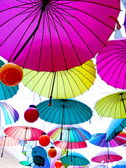 Many spanned colorful umbrellas in the sky - aufgespannte bunte Schirme am Himmel