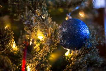 Obraz na płótnie Canvas christmas tree with blue ball