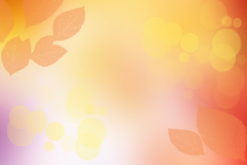 Autumn background. Abstract festive autumn gradient yellow pink bright background texture with leaves and bokeh circles. Space.