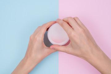 Clean clear finger natural nourishing fingernail concept. Above top overhead high angle flatlay flat lay close up view photo of beautiful flawless hands open unpack unwrap isolated pastel background