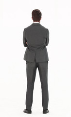 rear view. businessman looking at copy space