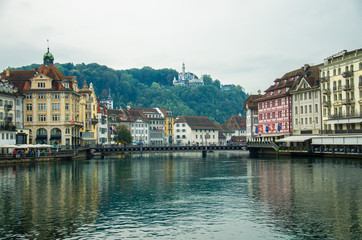 Fototapeta premium Reuss river from wooden Chapel Bridge, Luzern, Switzerland