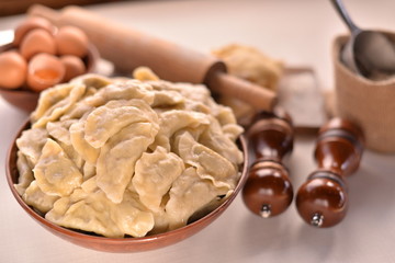 many dumplings in a clay bowl, series