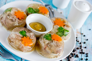 Aspic jellied meat with vegetables, traditional russian dish holodets