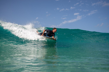 Naklejka premium surfer in action on the wave