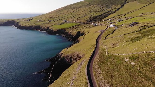 Aerial footage of the beautiful Slea head drive just outside of Dingle, Co Kerry. Situated on the south west coast of Ireland. This road is one of the most beautiful drives in the country.