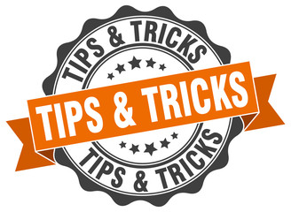 tips & tricks. stamp. sticker. seal. round grunge vintage ribbon tips & tricks sign