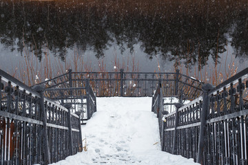 staircase in the forest on a snowy promenade