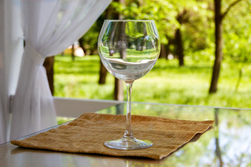  empty goblet on high stalk empty in gazebo