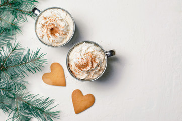 Fototapeta na wymiar Hot Drink with Whipped Cream and Heart Shaped Cookies, Romantic Winter Concept