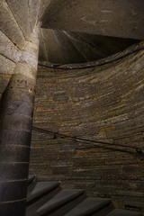 Dark stone spiral staircase inside the tower