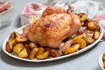 Whole roasted chicken with potato