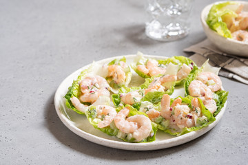 Shrimp salad wraps in lettuce leaves