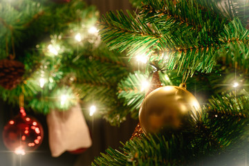 Close up christmas tree decorated with christmas balls and light