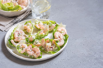 Shrimp salad wraps in lettuce leaves