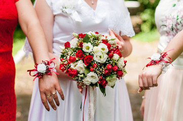 Wedding bouquet and hands