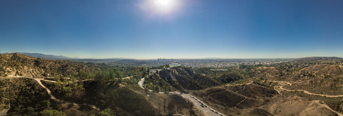 Panoramic view of Los Angeles and the Griffith Observatory as seen from the Hollywood hills