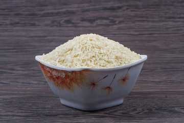 indian basmati rice isolated on texture background.