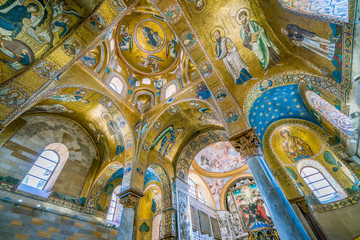 The golden dome with Christ in throne in The Martorana (Cathedral of Saint Mary of the Admiral) in...