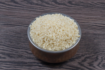 indian basmati rice isolated on texture background.