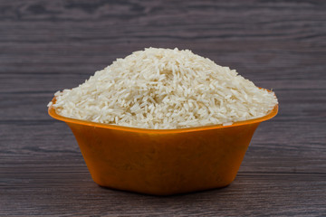 indian basmati rice isolated on texture background.