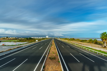 Ultra long exposure of empty freeway and cloudscape