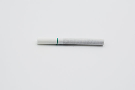 A cigarette isolated on a white background.