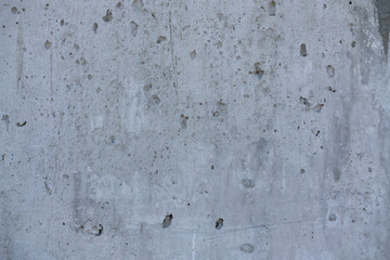 Background - the fragment of a concrete wall.