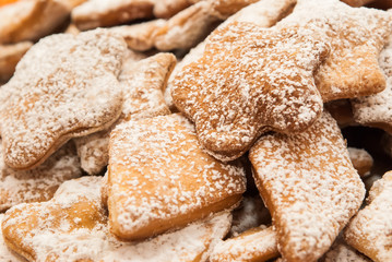 Delicious homemade shortbread cookies in powdered sugar