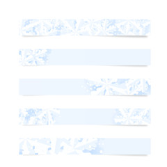 Set of thin horizontal winter web banners with snowflakes and snow on a blue background.