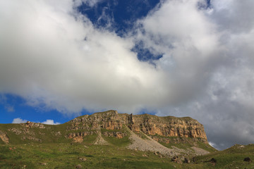 View of the mountain plateau in the clouds in the summer in the North Caucasus in Russia.