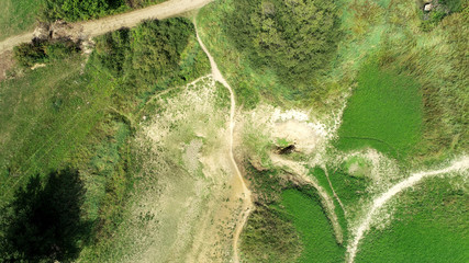 Swallow hole (sink, sinkhole, ponor) Rešeto and Vodonos on Cerknica Polje (Cerkniško polje), Slovenia is a point where waters from the surface submerge into cave system of karst.