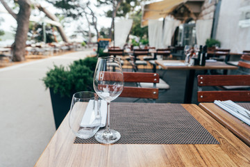 Two glasses on the table. Street summer cafe