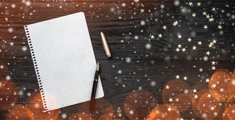 Wallpaper of winter holidays on black background. Letter for Santa Claus. Space for text. Top view....