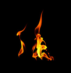 Fototapeta premium Fire flames on black background