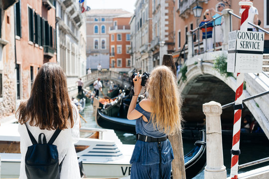 Two young girls stand on the gondola service