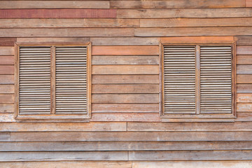 Fototapeta na wymiar Thai Double Wooden Shutter Windows