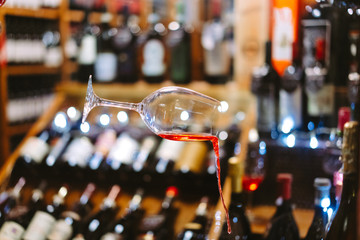 Glass of Wine Falling Mid Air with Spill