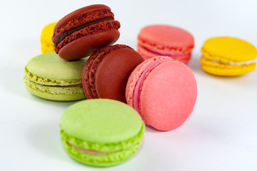 Macaron cakes of different colors isolated on a white background