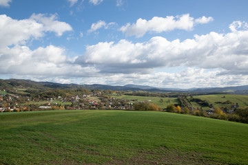 A view of the hill called Helfštýn on the field and the surrounding can be seen village Krhová during a sunny day