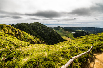 Mountain landscape with hiking trail and view of beautiful lakes Ponta Delgada, Sao Miguel Island, Azores, Portugal.