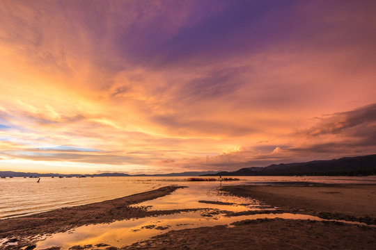 Colorful sunset in South Lake Tahoe California with orange, pinks and purple bright colors in the sky