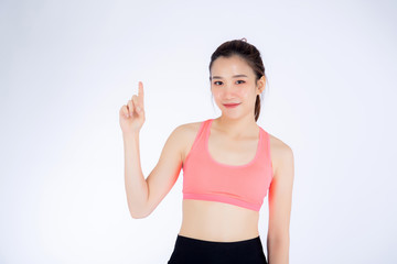 Fototapeta na wymiar Beautiful portrait young asian woman in sport clothing with satisfied and confident isolated on white background, girl asia have wellness finger point something, exercise for fit with health concept.