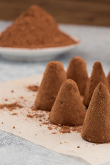 Chocolate candy powder with cocoa powder.
