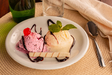 petit gateau delicious deocrado with cherry and mint.