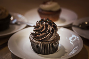 Muffin (cake) with chocolate cream