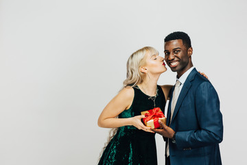  Portrait of a young woman, isolated on light gray studio background
