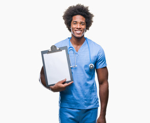 Afro american surgeon doctor holding clipboard man over isolated background with a happy face standing and smiling with a confident smile showing teeth