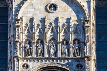 Details of exterior of Como Cathedral (Duomo di Como), Lombardy, Italy